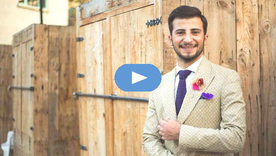 Mentors, Men, and Leaning Into Closed Doors young white man wearing a suit standing in from of closed doors